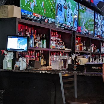 My Father’s Moustache - The side of the bar and some of their six TVs - Breakfast & Brunch Near Me - Charleston, South Carolina My Father’s Moustache - The side of the bar and some of their six TVs - Breakfast & Brunch Near Me - Charleston, South Carolina