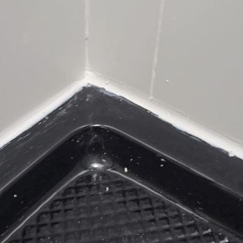 Terraform Construction - shower silicone done with toilet paper instead of edging tool - General Contractors Near Me - Brooklyn, New York