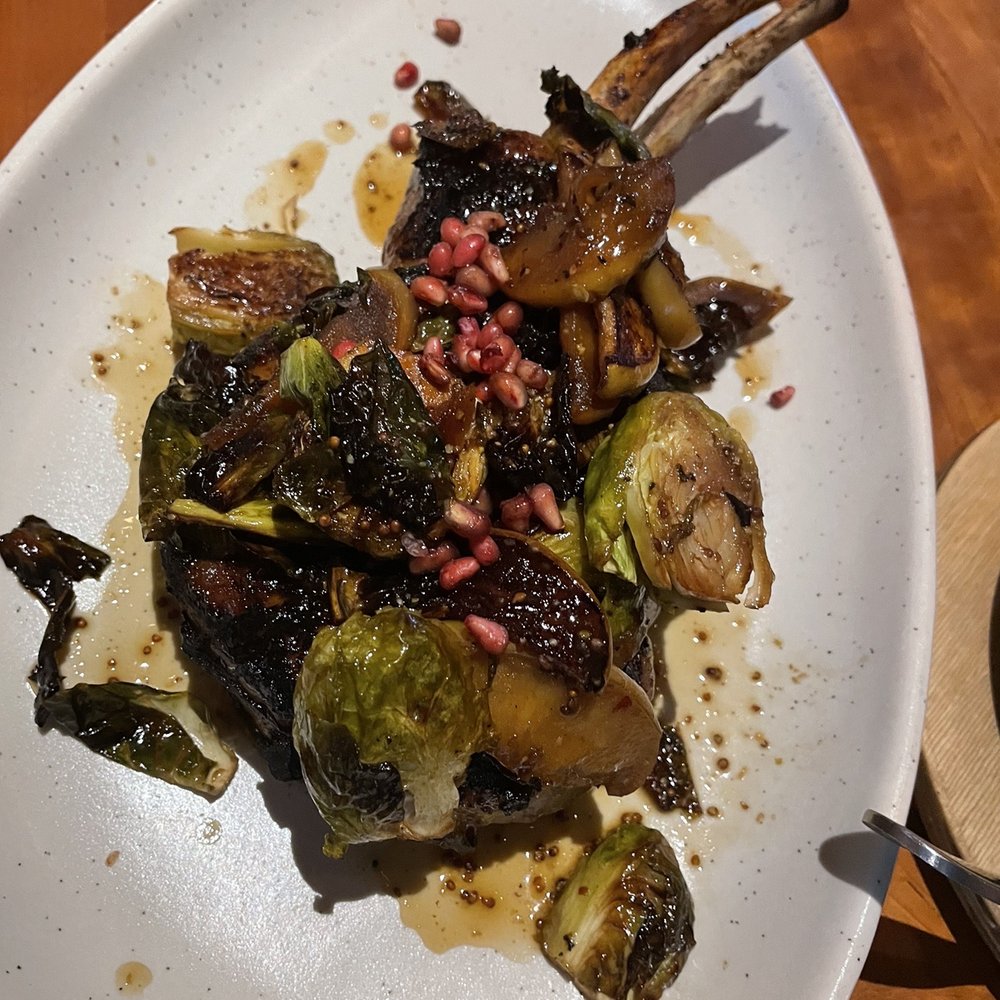 Roaring Fork - Pork tomahawk - New American Near Me - Austin, Texas Roaring Fork - Pork tomahawk - New American Near Me - Austin, Texas