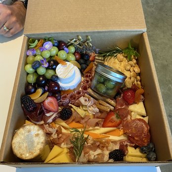 Cal Limo - Delicious box of cheese, charcuterie, fruit, etc. from Cured and Cultivated. - Limos Near Me Cal Limo - Delicious box of cheese, charcuterie, fruit, etc. from Cured and Cultivated. - Limos Near Me