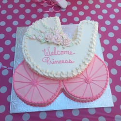 Nostalgia House Bakery - My baby shower cake for our little princess. The cake was sooo good. The wheels are pink champagne and the carriage is red velvet.