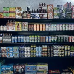 Craft City Bottle Shop &Taproom - Shelves of craft beer for sale. And there's more!