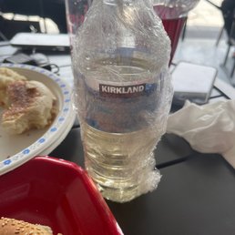 a sandwich and a bottle of water a sandwich and a bottle of water