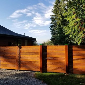 Premier Fence - a close up of a wooden fence - General Contractors Near Me - Marysville, Washington Premier Fence - a close up of a wooden fence - General Contractors Near Me - Marysville, Washington