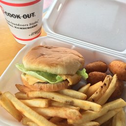 a sandwich and french fries in a styrofoam container a sandwich and french fries in a styrofoam container