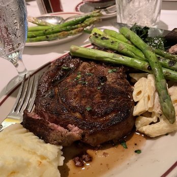 Bones - 20 Oz Ribeye, mashed potatoes with truffles, asparagus, amd Mac n' cheese. - Steakhouses Near Me - Atlanta, Georgia Bones - 20 Oz Ribeye, mashed potatoes with truffles, asparagus, amd Mac n' cheese. - Steakhouses Near Me - Atlanta, Georgia