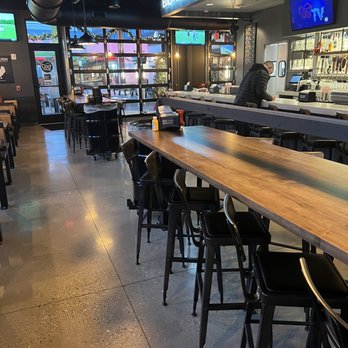 Dog Haus - High top table and part of the bar - Burgers Near Me - Franklin, Wisconsin