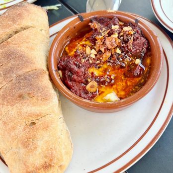 Tiny Champions - Baked feta with tomato chili crunch & ciabatta - this was a favorite at the table - Pizza Near Me - Houston, Texas Tiny Champions - Baked feta with tomato chili crunch & ciabatta - this was a favorite at the table - Pizza Near Me - Houston, Texas