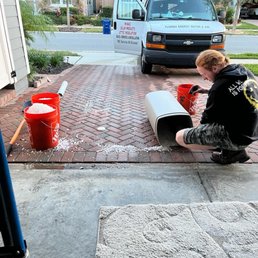 Putting the dirty salt from the ground back into container
