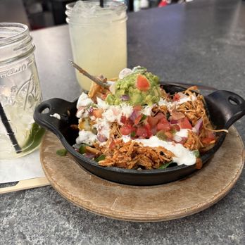 Nacho Daddy - Fiesta nachos with house margaritas. Minis are just the right size for one! Delicious! - New American Near Me - Las Vegas, Nevada Nacho Daddy - Fiesta nachos with house margaritas. Minis are just the right size for one! Delicious! - New American Near Me - Las Vegas, Nevada