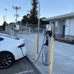 Chargepoint - 3 charging stations $2 session fee + $1.00 for parking. After 4hrs, parking increases to $10/hr