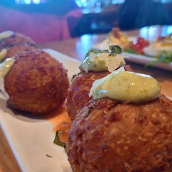 Nose Dive - Check out those perfectly round cheese bombs! White Cheddar Fritters - Gastropubs Near Me - Greenville, South Carolina