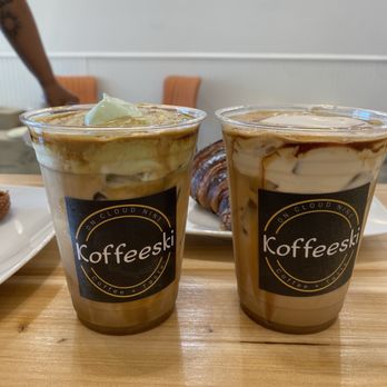 Koffeeski - Left: Banana Kick Cream Latte Right: Pandan Cream Latte - Coffee & Tea Near Me - Los Angeles, California Koffeeski - Left: Banana Kick Cream Latte Right: Pandan Cream Latte - Coffee & Tea Near Me - Los Angeles, California