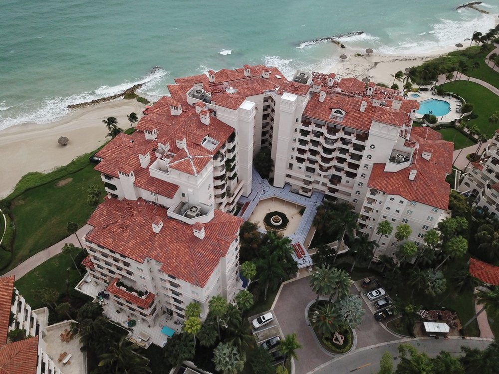 Slide of Perkins Roofing - Miami