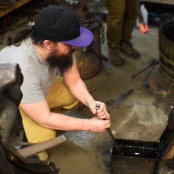 White Hart Forge - Quenching a knife in oil - Metal Fabricators Near Me White Hart Forge - Quenching a knife in oil - Metal Fabricators Near Me