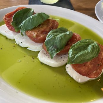 Tre Trattoria - SLOW-ROASTED TOMATO CAPRESE - Italian Near Me - San Antonio, Texas Tre Trattoria - SLOW-ROASTED TOMATO CAPRESE - Italian Near Me - San Antonio, Texas