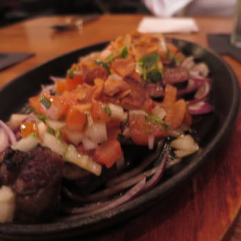 Made In Brasil Boteco - Rump beef with onions and garlic - Cocktail Bars Near Me - London, XGL Made In Brasil Boteco - Rump beef with onions and garlic - Cocktail Bars Near Me - London, XGL