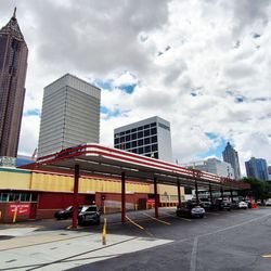 City of Atlanta - The Varsity, probably much larger than when founded in 1928, sits here with its parking and drive-through seemingly defying Midtown's growth