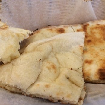 Nirvana Indian Restaurant - Perfectly cooked naan bread - Indian Near Me - Houston, Texas Nirvana Indian Restaurant - Perfectly cooked naan bread - Indian Near Me - Houston, Texas