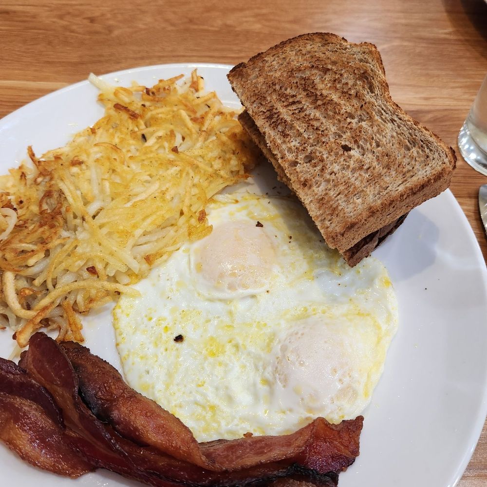 Broken Yolk Cafe - Americanabreakfast. Bacon was chewy and toast was cold and had NO butter. - American Near Me - Phoenix, Arizona Broken Yolk Cafe - Americanabreakfast. Bacon was chewy and toast was cold and had NO butter. - American Near Me - Phoenix, Arizona