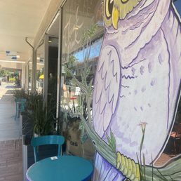 Owl on watch near entrance.