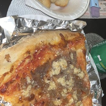 Siena's Pizza - Meatball slice with fresh garlic on top and a side of garlic knots - Pizza Near Me - Monticello, New York Siena's Pizza - Meatball slice with fresh garlic on top and a side of garlic knots - Pizza Near Me - Monticello, New York