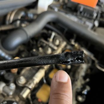 Elite Auto Repair - Frayed tubing around turbo - Auto Repair Near Me - Pomona, California Elite Auto Repair - Frayed tubing around turbo - Auto Repair Near Me - Pomona, California