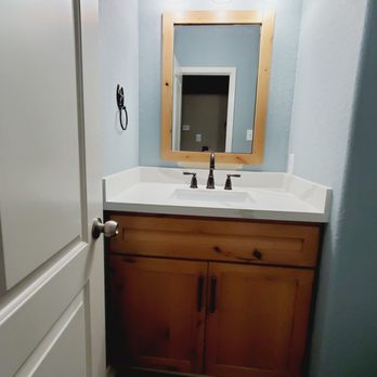 Mendiola Remodeling & Construction - Half bath with custom built vanity - General Contractors Near Me - Houston, Texas