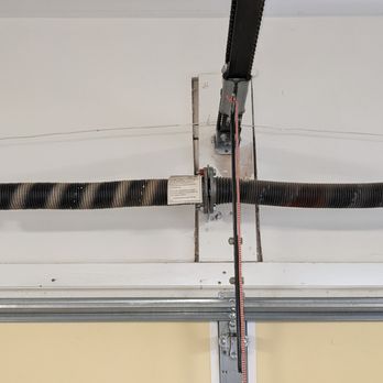 Diamond Garage Doors - Obviously a broken left spring; Matt and Susan each recommended replacing both springs so they're the same age. - Garage Door Services Near Me - Gainesville, Virginia Diamond Garage Doors - Obviously a broken left spring; Matt and Susan each recommended replacing both springs so they're the same age. - Garage Door Services Near Me - Gainesville, Virginia