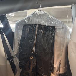 White shirt, black pants. Dry cleaned.