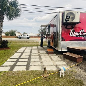 Estilo Casero - a dog standing in front of a truck - Mexican Near Me - Orlando, Florida