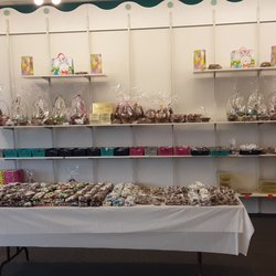 Andy's Candies - Left side has fruit-filled chocolate eggs, milk chocolate crayons, chocolate Easter baskets and chocolate candy- filled eggs