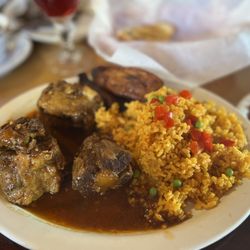 Bella Cuba - Ox tail with yellow rice. You get 3 pieces of oxtail.