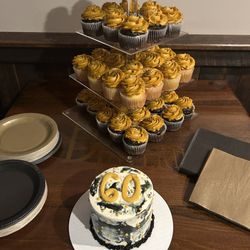 Grandview Bakery - 4" layer cake with chocolate and raspberry filling. Yellow cupcakes with chocolate filling and chocolate cupcakes with raspberry filling.
