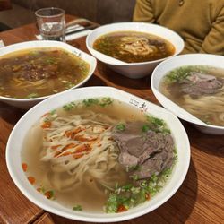 Le Mien Craft Noodle - Front: Traditional Hand Pulled Noodle with Beef - Joye (Medium $17.99), Back: Braised Beef Tendon in Brown Sauce - Two Xi ($18.49)