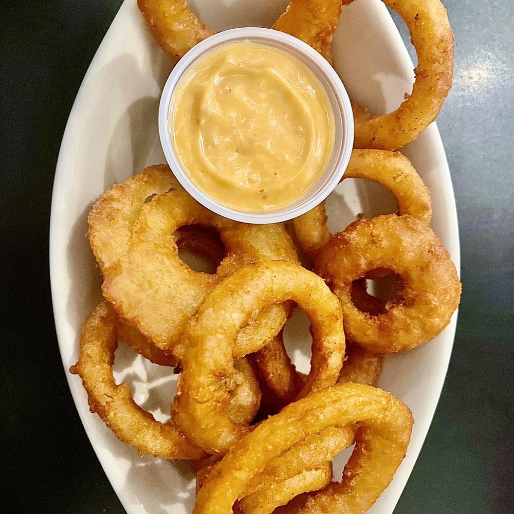 Rick's Crossroads Grille - Onion Rings with Sabi Sauce - Steakhouses Near Me - Lincoln, Alabama Rick's Crossroads Grille - Onion Rings with Sabi Sauce - Steakhouses Near Me - Lincoln, Alabama