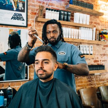 Artisan Barber - Charlie McCoy Oyekwe using shear point texturing method on a Classic Haircut - Barbers Near Me - New York, New York Artisan Barber - Charlie McCoy Oyekwe using shear point texturing method on a Classic Haircut - Barbers Near Me - New York, New York