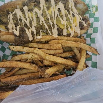 Don Philly HTX - a hot dog and french fries - Food Trucks Near Me