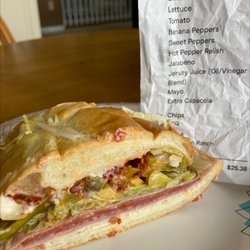 Jersey Giant Submarines - See where it says extra capacola on the receipt. Do you see extra capacola on the sandwich? Neither do I!