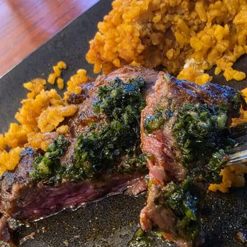 Inka Grill - The juicy medium rare steak from the Bistec a lo Pobre main entrée. - Peruvian Near Me - Roanoke, Virginia Inka Grill - The juicy medium rare steak from the Bistec a lo Pobre main entrée. - Peruvian Near Me - Roanoke, Virginia