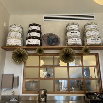 An's Hatmakers - Inside at counter. Flavors are on the hatboxes. - Gelato Near Me - Del Mar, California
