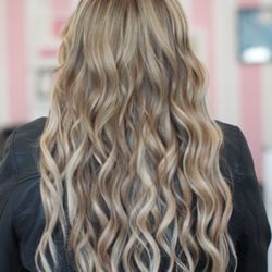 Tress+Mane Hair Extension Salon - NBR extensions by Yvette. Two rows of NBR hand tied extensions. Highlights on client and extensions for this perfect match.