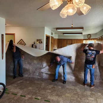 Seland’s Karpetland - Laying the new 17 foot roll. - Carpeting Near Me - Coon Valley, Wisconsin Seland’s Karpetland - Laying the new 17 foot roll. - Carpeting Near Me - Coon Valley, Wisconsin