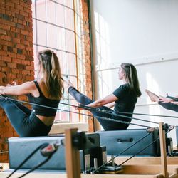 Iron Butterfly Pilates - Pilates Reformer Group Class