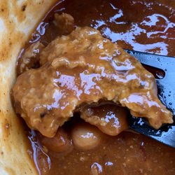 Wendy's - Chili has OLD leftover burger patty meat in it, appears to have been bitten..