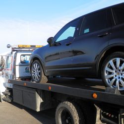 Denali Towing - Carrying a Porsche SUV to Anchorage from Fairbanks for Warranty work...........Safe with us!!