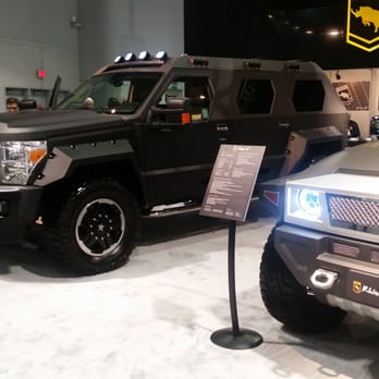SEMA Show - Two vehicles that look like armored trucks but just for looks. Would be better if they were real armor. Still 200,000 for the Chinese market - Festivals Near Me - Las Vegas, Nevada SEMA Show - Two vehicles that look like armored trucks but just for looks. Would be better if they were real armor. Still 200,000 for the Chinese market - Festivals Near Me - Las Vegas, Nevada