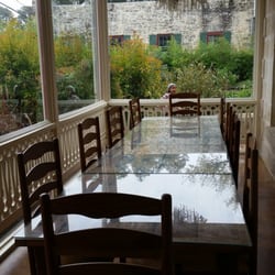 The Legendary Texas Polo Club - Inside dining table with a beautiful view of the pond