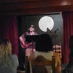 Cascade Voice Academy - One of our hard working students at open mic night at Black Dog Cafe