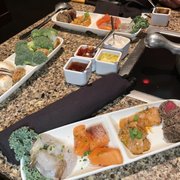 Photo of The Melting Pot - Colorado Springs, CO, United States. Land and Sea